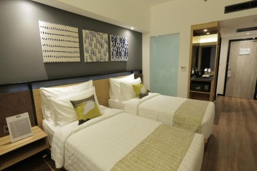 Imagen de la habitación del Hotel Muraya Hotel Aceh. Foto 9