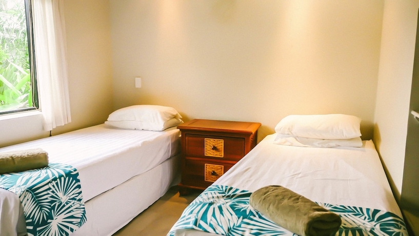Imagen de la habitación del Hotel Muri Beach Resort. Foto 11