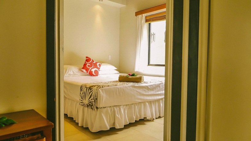 Imagen de la habitación del Hotel Muri Beach Resort. Foto 12