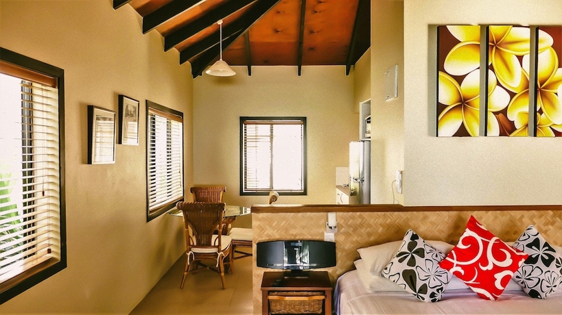 Imagen de la habitación del Hotel Muri Beach Resort. Foto 13