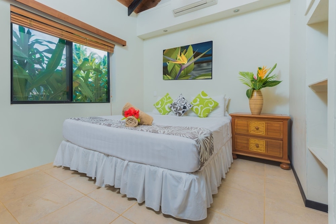 Imagen de la habitación del Hotel Muri Beach Resort. Foto 16