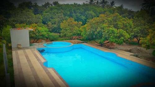 Imagen general del Hotel Murlidhar Farm Jamnavad. Foto 6