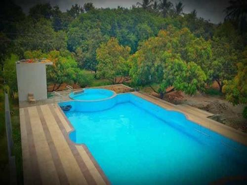 Imagen general del Hotel Murlidhar Farm Jamnavad. Foto 12