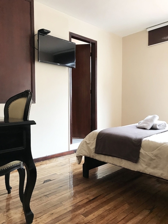 Imagen de la habitación del Hotel Muros Quito. Foto 2