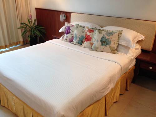 Imagen de la habitación del Hotel Murraya Residence. Foto 2