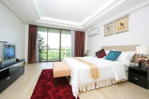 Imagen de la habitación del Hotel Murraya Residence. Foto 7
