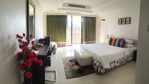 Imagen de la habitación del Hotel Murraya Residence. Foto 8