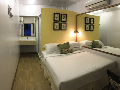 Imagen de la habitación del Hotel Murraya Residence. Foto 9