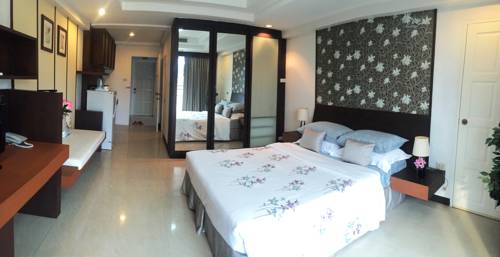 Imagen de la habitación del Hotel Murraya Residence. Foto 11