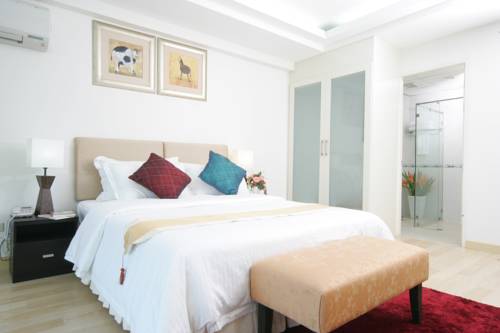 Imagen de la habitación del Hotel Murraya Residence. Foto 14