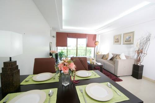 Imagen de la habitación del Hotel Murraya Residence. Foto 16