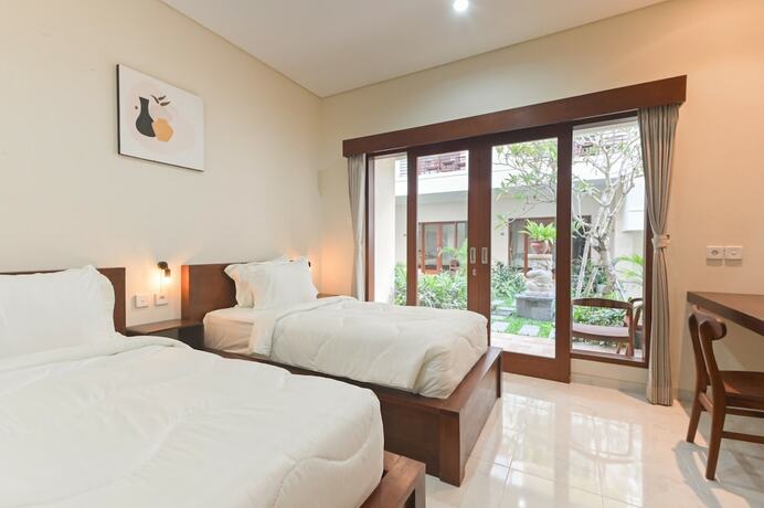 Imagen de la habitación del Hotel Musa Canggu. Foto 15