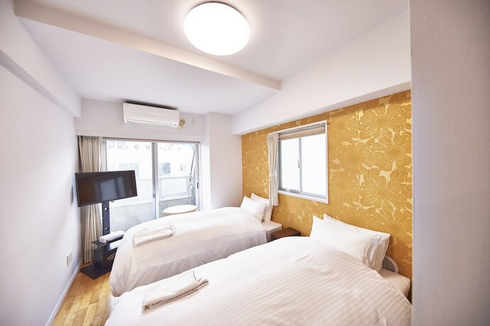 Imagen de la habitación del Hotel Musbee Tokyo Hamamatsucho. Foto 2