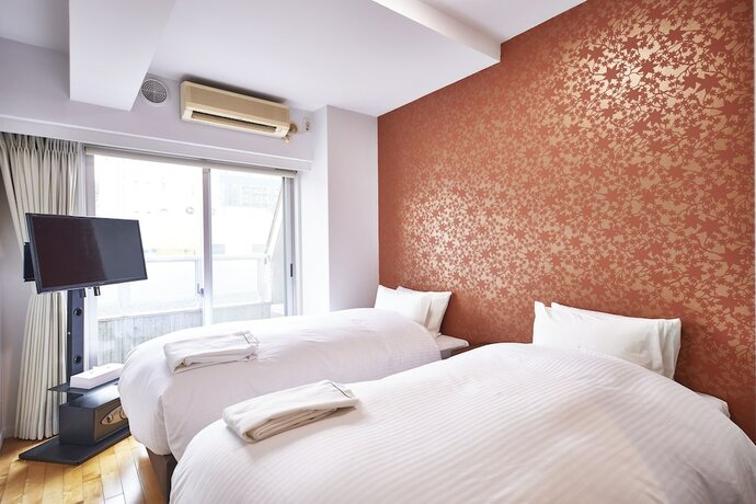 Imagen de la habitación del Hotel Musbee Tokyo Hamamatsucho. Foto 10