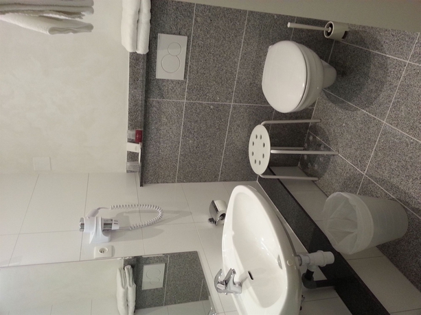 Imagen de la habitación del Hotel Musee Gare. Foto 2