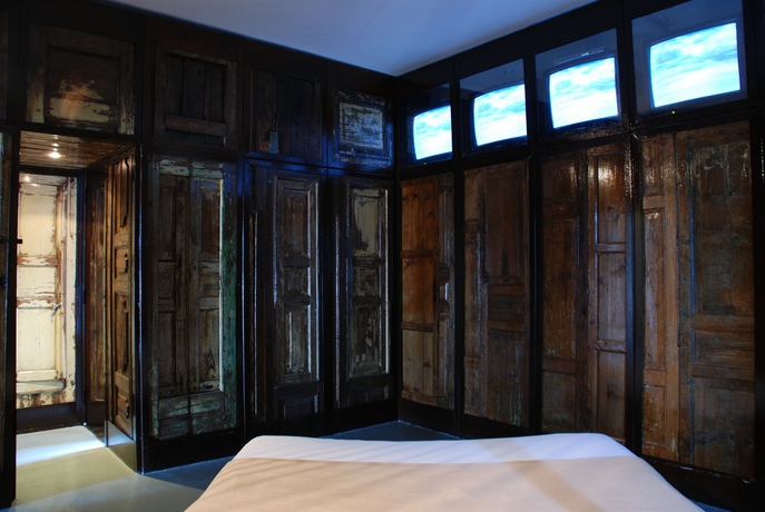 Imagen de la habitación del Hotel Museo Albergo D'arte Contemporanea Atelier Sul Mare. Foto 4