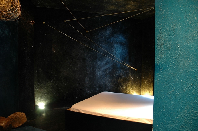 Imagen de la habitación del Hotel Museo Albergo D'arte Contemporanea Atelier Sul Mare. Foto 10