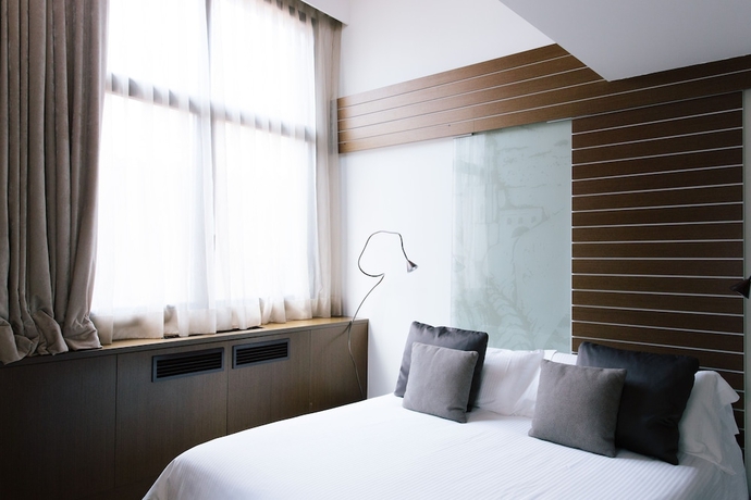 Imagen de la habitación del Hotel Museu Llegendes De Girona. Foto 12