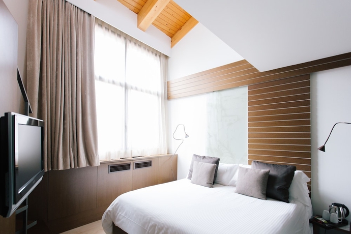 Imagen de la habitación del Hotel Museu Llegendes De Girona. Foto 13