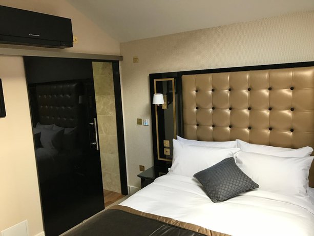 Imagen de la habitación del Hotel Museum Hotel Oxford. Foto 6