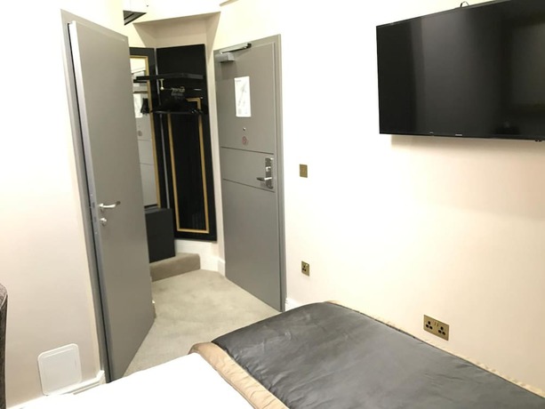 Imagen de la habitación del Hotel Museum Hotel Oxford. Foto 19