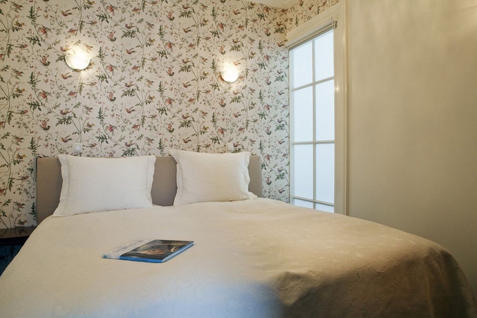 Imagen de la habitación del Hotel Museum Suites. Foto 4