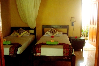 Imagen de la habitación del Hotel Mushroom Beach Bungalows. Foto 11