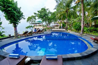 Imagen de la piscina del Hotel Mushroom Beach Bungalows. Foto 16