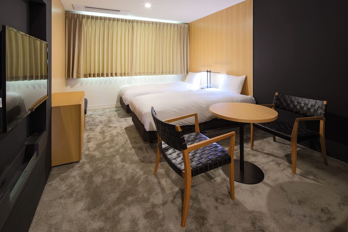 Imagen de la habitación del Hotel Muso. Foto 8
