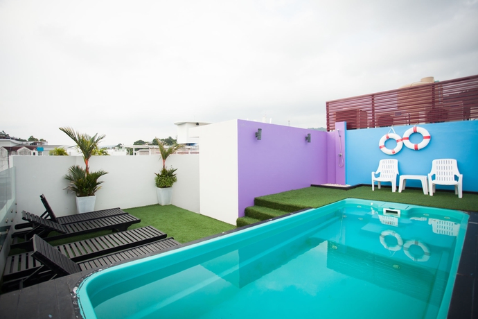 Imagen de la piscina del Hotel Must Sea Kata. Foto 15