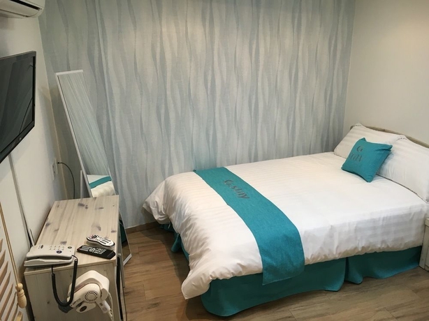 Imagen de la habitación del Hotel Must Stay. Foto 9