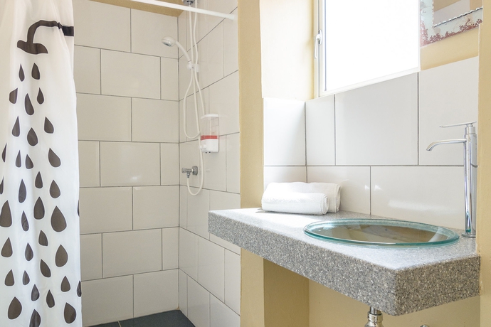 Imagen de la habitación del Hotel Mustique Suites Curacao. Foto 6