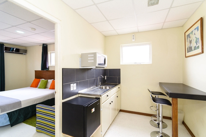 Imagen de la habitación del Hotel Mustique Suites Curacao. Foto 9