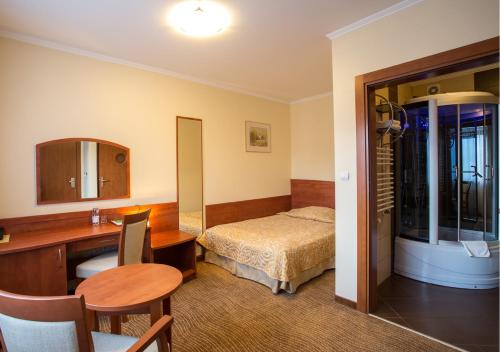 Imagen de la habitación del Hotel Muszyna. Foto 3