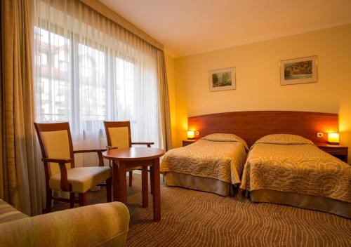 Imagen de la habitación del Hotel Muszyna. Foto 4
