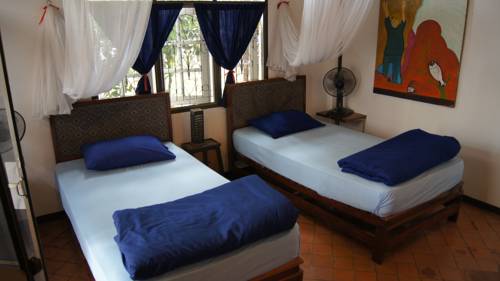 Imagen de la habitación del Hotel Mut Mee Garden Guest House. Foto 3