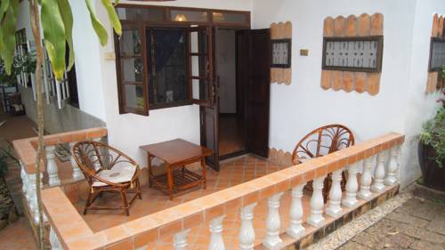 Imagen de la habitación del Hotel Mut Mee Garden Guest House. Foto 4