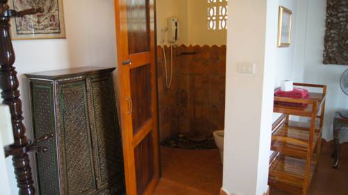 Imagen de la habitación del Hotel Mut Mee Garden Guest House. Foto 7