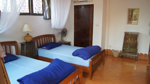 Imagen de la habitación del Hotel Mut Mee Garden Guest House. Foto 8