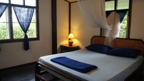 Imagen de la habitación del Hotel Mut Mee Garden Guest House. Foto 9