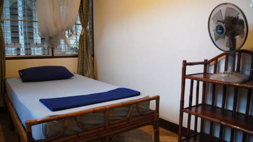 Imagen de la habitación del Hotel Mut Mee Garden Guest House. Foto 10