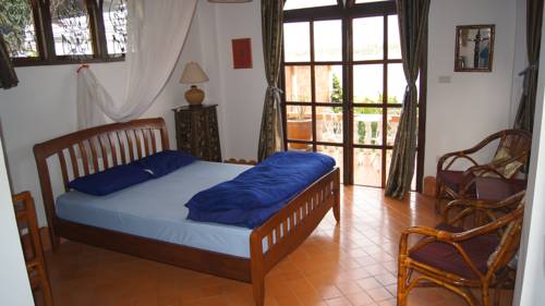 Imagen de la habitación del Hotel Mut Mee Garden Guest House. Foto 12