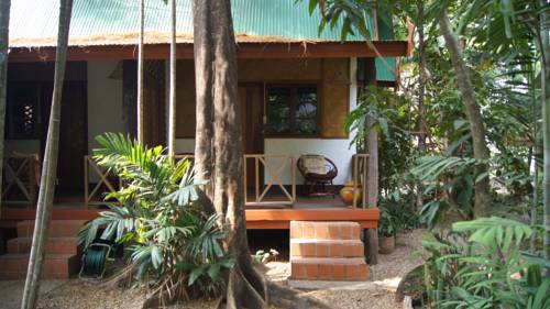 Imagen de la habitación del Hotel Mut Mee Garden Guest House. Foto 14