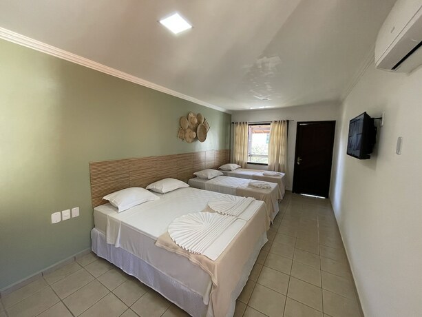 Imagen de la habitación del Hotel Mut&aacute; Praia. Foto 17