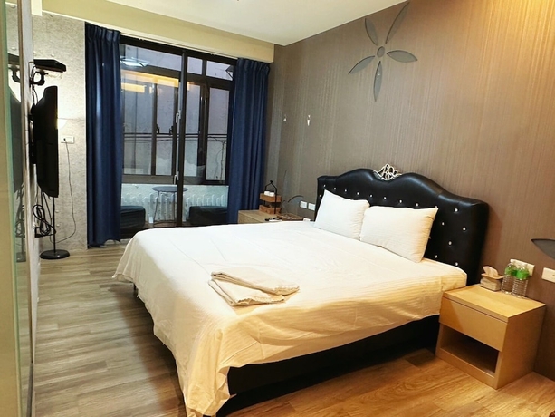 Imagen de la habitación del Hotel Mutaixu-HotSpring. Foto 2