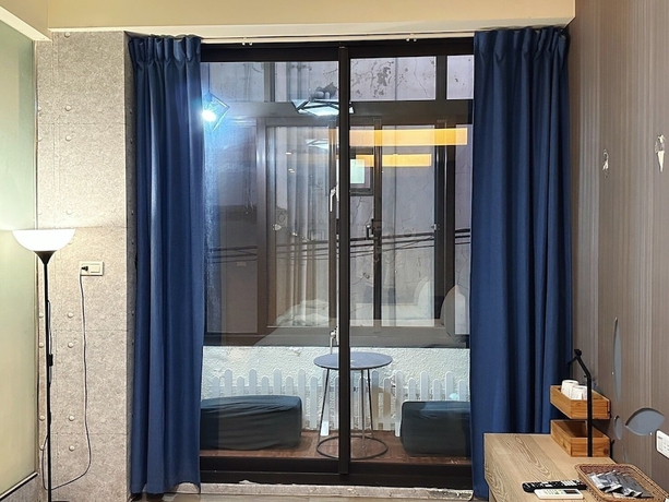 Imagen de la habitación del Hotel Mutaixu-HotSpring. Foto 13