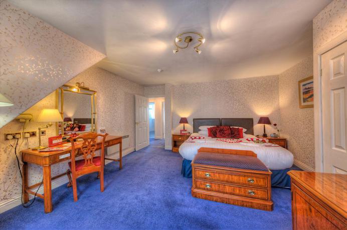 Imagen de la habitación del Hotel Muthu Queens Hotel. Foto 12