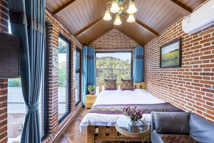 Imagen de la habitación del Hotel Mutianyu GreatWall Wangshanyuan Homestay. Foto 3