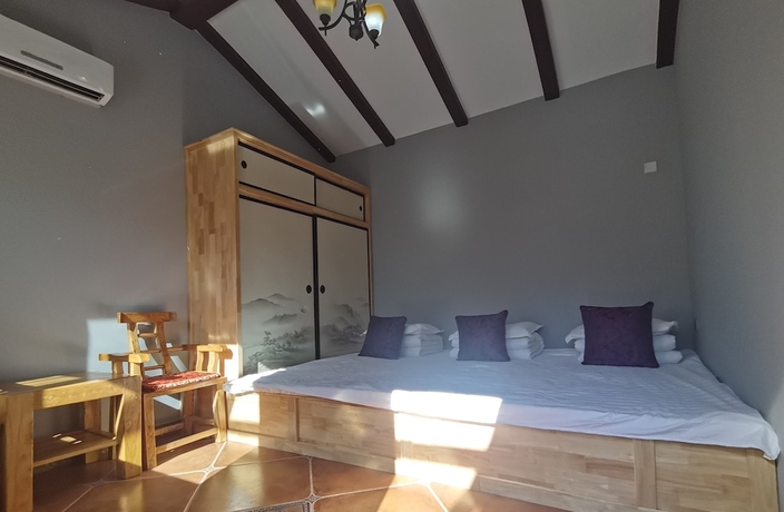 Imagen de la habitación del Hotel Mutianyu GreatWall Wangshanyuan Homestay. Foto 6