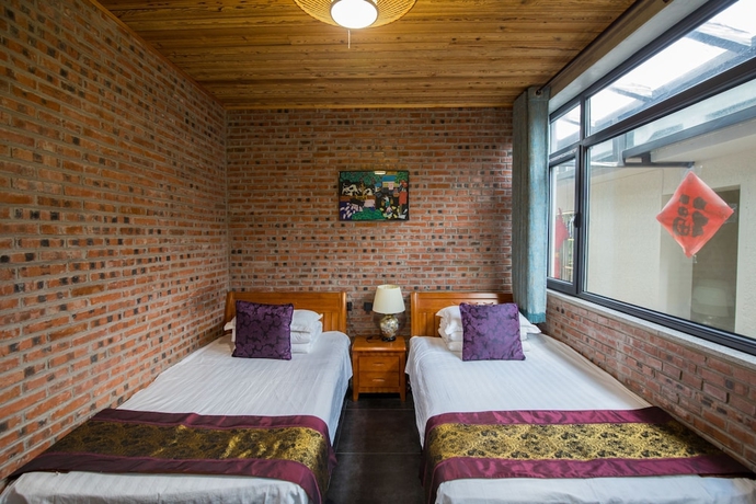 Imagen de la habitación del Hotel Mutianyu GreatWall Wangshanyuan Homestay. Foto 8